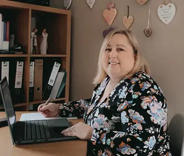 Mature student working at home desk